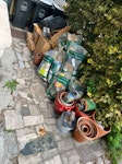 boxes and garden waste mixture of boxes of old household items and some garden materials E8 - removed for £104