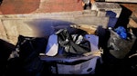 4 bags and a couple of plexy A few bags (4), including a ueed toilet and 2/3 boards of plexyglass. SE15 - removed for £83