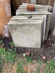 Approx 20 concrete paving slab Approx 18 concrete paving slabs.
1 metal wheelbarrow broken. TW10 - removed for £130