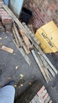 small pile of decking rubbish is outside in carpark SW16 - removed for £47