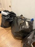 rubbish bags, timber plates 7 Rubbish bags, timber plates NW1 - removed for £84