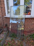 Large pane of glass Large pane of glass. Small pane in photo not required to be removed. B26 - removed for £94