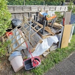 old carpet and miscellaneous A pile of old carpet, an empty wheelie bin, a few pallets, wood stuff, a few plastic items, a small box with miscellaneous items. TW8 - removed for £156