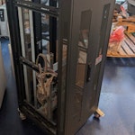 office clearance wooden pallet large, one standing metal cabinet. other cabinet on a desktop, desktop large pile of rubbish boxes ect. SW18 - removed for £182