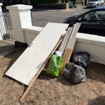 Builders Waste, Clothes Bags Leftover Flooring material, 1 old door, bag of decorators waste, 2x bags of old clothing N7 - removed for £71