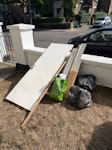 Builders Waste, Clothes Bags Leftover Flooring material, 1 old door, bag of decorators waste, 2x bags of old clothing N7 - removed for £71