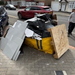bathroom replacement waste on bathroom renovation, only floor tiles in waste HA4 - removed for £257