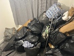 Bags of rubbish It has old clothes, cardboard papers and rails M7 - removed for £83