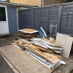 Renovation waste Mixed renovation waste: timber, OSB/plywood, old flooring, panels and radiators. Includes 2 full-size 1200 x 2400mm boards (may need cutting for loading). Everything shown in photos. Easy access from driveway/patio. GU2 - removed for £185