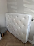 mattress and bed frame A double bed mattress and the headboard and end of a bed frame. Bed frame is light and easy to move. IG3 - removed for £83