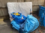 mattress, paddling pl, clothes Double mattress, Two paddling pools, broken pump and 4 bags of clothing which could go to charity. It is in front of the parked van and covered with blue tarp to protect from rain. BN3 - removed for £94