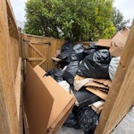 Bags of rubbish and cardboard Empty 4 residential rubbish bins + remove rubbish black bin bags and cardboard. GU24 - removed for £293