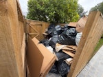 Bags of rubbish and cardboard Empty 4 residential rubbish bins + remove rubbish black bin bags and cardboard. GU24 - removed for £293