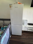 155 cm fridge and small sofa A 155cm fridge and a small L-shaped sofa B42 - removed for £234