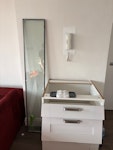 boxed clothes mirror cupboard cardboard boxes (some flattened), broken glass, clothes, drawers NW6 - removed for £117