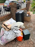 miscellaneous junk dry waste/junk. bags, cardboard, plastic. suitcase. SE13 - removed for £104