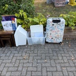 Small pile of junk Broken luggage case, plastic tubs, small nest of coffee tables and a robot BR6 - removed for £71