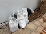 13 bags of soil 13 bags of soil from 5 old planters- no rubble whatsoever and one old wooden pallet. Level access down the side of building - ok for transit van but nothing bigger. The collection time to be agreed N5 - removed for £91