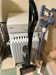 furniture, white goods, heater 1. folding table w folding chairs inside of the centre of the table. v nice. ; 2. large cat scratching post 3. two wooden dining room chairs 4. rug 5. 2 hoovers (may be fixable) 6. oil heater on wheels (may be fixable) 7. large cat carrier (suitable for transport) 8. miele tumble dryer (old, but may be fixable) 9. taped together large picture frames. 10. two glass and metal greenhouse cabinets (ikea) emptied (still full in photo but will be emptied). No photo yet of rug or picture frames. SW5 - removed for £156