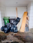 carpet, wood, plasterboard Old carpet, plasterboard, cupboard door, some sacks of plasterboard and rubbish from a built in wardrobe that was removed. Also some wood from the cupboard. NW6 - removed for £130