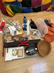 household rubbish CD player, some sparklers, paper and cardboard, clock and picture frame with broken glass, bag of metal nuts, scissors, some brushes, pens, canvas bags, pair of shoes, tablecloth, various other bits and pieces of metal, plastic, coir W4 - removed for £57