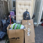 2 Mattresses, bed frame, boxes Hi, I need some stuff removed which is mostly a couple bin bags, a disassembled metal bed frame, two mattresses, two hoovers and an air fryer. Have added a picture for a better estimate. EN2 - removed for £130