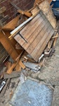 Demolished shed timber Demolished garden shed, left in a pile on the driveway. Mostly timber planks and framing, one shed door with hinges, some OSB boards, plus a small amount of loose bricks/rubble and wood offcuts. All outside at ground level, easy access, no stairs. No hazardous waste. TW12 - removed for £130
