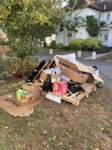 Wooden pallet and other waste Wooden pallet, boxes, and other solar installation waste TW11 - removed for £88