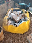 Hiiposkip Household Clearance Hi, I am in the process of filling up a Hipposkip bag in my side garden. It will be completely full in the next week. It is located some 30m from the road. The bulkly items would need to be carried and the bag could probably be dragged out with the smaller afterwards. I have illustrated the distance on a photo from the nearest parking. Sorry if you bid before. I missed the cut off. 😊 SE21 - removed for £286