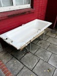 light acrylic bathtub it's a single, light acrylic bathtub ready to be collected at the downstairs outside property E1 - removed for £52