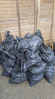 Bags soil and rubble half full collected by SS cleaning and clearance ltd