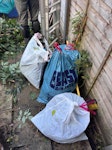 6 black bags of garden waste Garden waste with plastic pots in black bin bags x 6 and 2x sun lounger N17 - removed for £71