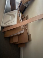 Junk cardboards and woodplanks collected by SS cleaning and clearance ltd