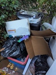 wheel bins plus some bags Household rubbish in bags + ripped outdoor furniture cushion W4 - removed for £71