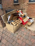 Mostly card. Miscellaneous. Mostly cardboard. Rabbit hutch. A few bin bags. SG4 - removed for £106