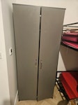 2 wardrobes 1 chest of drawers ​3 items total: 2x standard budget 2-Door Wardrobes, 1x 5-Drawer Chest of Drawers (All grey laminate/wood) NW6 - removed for £91