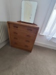 Chair, dressing table & fridge An armchair, wooden dressing table and mirror, and a tall fridge freezer. ME5 - removed for £130