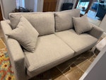 3 seater sofa 3 person oatmeal coloured cloth sofa. Clean and comfortable with two cushions. There is some wear on the arm on the LHS but may be reusable GU27 - removed for £130